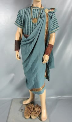 a mannequin dressed in an ancient greek costume