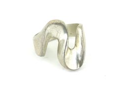 Vintage Mexico Squiggle Waved Design Ring 925 Sterling Silver RG 1619 Condition: Vintage  Metal: Sterling (.925) Silver  Weight: 10.7 grams  Size: 8.75 in   Width : 22.72 mm Images you see are actual pictures of jewelry you will receive Every purchase comes thoughtfully packaged and ships within 1 business day  New York State buyer will be charged sales tax Feel free to contact us with any questions.  We are open Mon-Fri 9-5 EST  We appreciate your business  View more great items Lost Wax Casting Rings, Lost Wax Jewelry, Sculptural Ring, Marquise Cut Rings, Metalsmithing Jewelry, Vintage Mexico, Swirl Ring, Casting Jewelry, Funky Jewelry