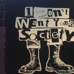 an image of someone's boots with the words i don't want your society on them