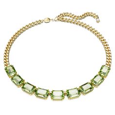 Embrace the feeling of joyful extravagance with this Millenia statement necklace. A fully articulated row of octagonal green crystals adorns the front, each displaying the mastery of Swarovski’s double-prong setting technique. For a contemporary touch, the design features a chunky gold-tone plated chain with a lobster closure and a single Swarovski Zirconia decorating the end. This necklace will complement everything from cocktail attire to a white t-shirt. Swarovski Set Crystal Necklace, Sage Green Crystal Necklace, Swarovski Jewelry Millenia, Sage Green Necklaces, Swarovski Millenia, Silver Pearl Necklace, Crystal Chain, Gold Necklaces, Cross Jewelry