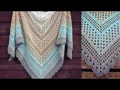 a crocheted shawl hanging on a wooden wall with the top half open