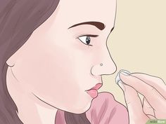 a woman brushing her teeth with an electric toothbrush