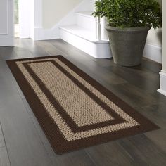 Sisal Border accent rug features clean and simple lines to go with almost any decor. This 100% polyester construction is both stain resistant and durable making it perfect for any room of your home. Style Selections 2 x 6 (ft) Tufted Polyester Brown Tan Rectangular Indoor Border Machine washable Runner rug | B2892704 Indoor Tanning, Accent Rugs, Simple Lines, Mat Rugs, Bath Rugs, Rug Decor, Door Mat, Rug Runner, The Selection