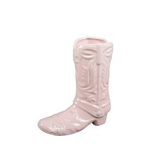 a pair of pink cowboy boots on a white background