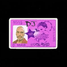 a purple and black id card with a man's face on it