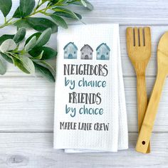 a kitchen towel that says neighborss by chance friends by choice make lane crew