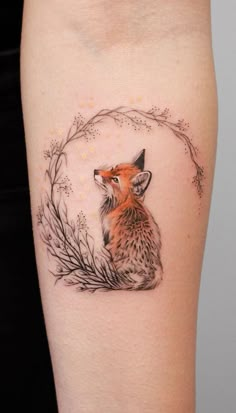 a small fox tattoo on the right thigh