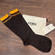 Super Cute Long Fendi Socks. 100% Authentic & Brand New With Tags. Comes With Dust Bag. Size M. Please Ask All Questions Before Purchasing As All Sales Are Final Ig: @Valleydesignervintage Fendi Socks, Fendi Store, Fendi Accessories, Fendi Logo, Stocking Tights, Nylon Stockings, Yellow Fashion, Black Tights, Black Logo