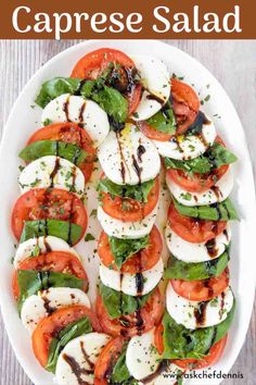 caprese salad with mozzarella, tomatoes and basil on a white plate