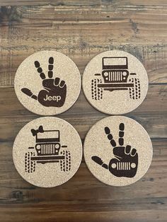 four jeep coasters with hand prints on them