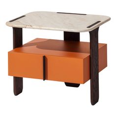 an orange and white table with two drawers on each side that has a marble top