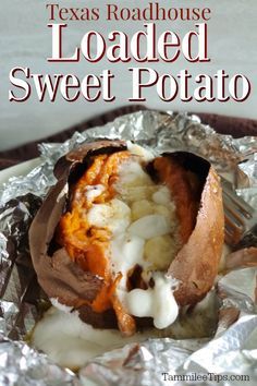 the inside of a loaded sweet potato on tin foil with text overlay that reads texas roadhouse loaded sweet potato