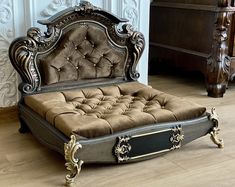 an antique style bed is shown in this image