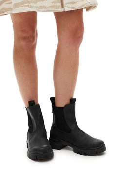 The City Boots are made from 50% recycled rubber, featuring elastic panels, toe cap detail, pull tabs and chunky soles. GANNI City Boots in Black | Women's Size 6 | Recycled rubber/Rubber City Boots, Buckled Flats, Flatform Sandals, Rubber Shoes, Classic Boots, Rubber Boots, Recycled Rubber, Slingback Pump, Rubber Heels