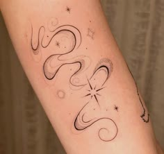 a woman's arm with the word love written in cursive writing