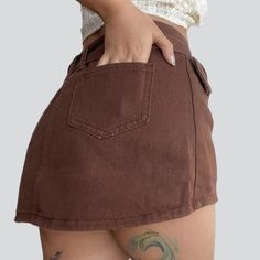 Brown ladies mini jean skirt online—cool women's denim skirt from the 2023 Summer collection. Street-style denim is the perfect blend of classic and modern fashion. This style is associated with timeless pieces not limited to any particular era yet representing a contemporary, stylish look. With street-style denim, you can express yourself freely and show off your unique style comfortably and functionally. You don't have to worry about conforming to trends or feeling pressured to wear something Mini Jean Skirt, Brown Mini Skirt, Womens Denim Skirts, Ankle Sandals, Denim Patterns, Skirts Online, Jean Skirt, Contemporary Fashion, Premium Denim