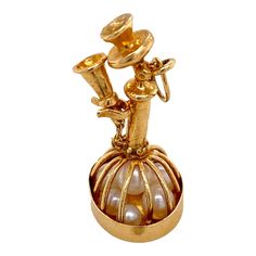 This is part of Chairish’s Fine Jewelry assortment.  This is a vintage charm in the form of a Candlestick Retro Telephone. The mouth piece comes off the hook and there are pearls at the base of the charm. Condition is very good and it dates c. 1960. Dimensions: Height: 1 1/4". Bpttp, 58" by 1/2" Retro Telephone, Off The Hook, The Hook, Vintage Charms, Charm Jewelry, Charm Pendant, Dates, Fine Jewelry, Charm Bracelet