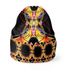 a beanie hat with an abstract design on it