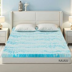 an image of a bed with blue water on it