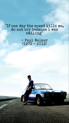 a man sitting on the hood of a blue car with a quote from paul walker