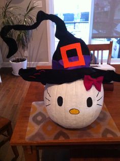 a hello kitty pumpkin sitting on top of a table