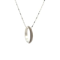 electric guitar string ring necklace on white background