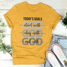 "Today's goals start with God, stay with God, end with God" Unisex T-shirt is created by our Avis89 designers that you can't find any elsewhere.Perfect outfit for both indoor and outdoor activities and easy to match with jeans, shorts, pants or other accessories.It would be an ideal gift for friends or family on special occasions. Let's make you and your loved one more unique and exclusive in others' eyes!Product Details Gildan's classic midweight fabric is comfortable with sublimation printing Tee Shirt Designs Ideas, Custom Shirts Ideas, Popular Tshirt Designs, Christian T Shirt Ideas, Christian Shirt Ideas, Cute T Shirt Designs, Christian Shirts For Women, Christian Tee Shirts, Christian Shirts Designs