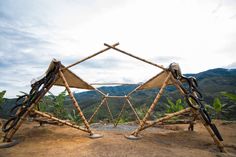 some kind of structure made out of bamboo sticks