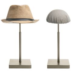 Featuring a domed top and metal construction, this set of 2 hat display riser stands are an excellent way to keep your hats accessible and add a touch of rugged decorative accent to your home or retail setting. Its small footprint can keep conveniently stored on a dresser, table, or counter top surface. The fabric dome top can protect the hat or helmet lining and help preserve hat's proper structure to maintain the appearance. The minimalist bronze metal construction nicely complements a wide ra Wide Coat, Entryway Rack, Cap Rack, Hat Holder, Hat Display, Hair Accessories Set, Wig Stand, Hat Rack, Hat Stands