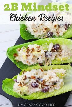 lettuce wraps filled with chicken salad on a black tray