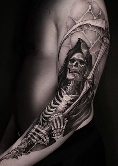 a man with a skeleton tattoo on his arm