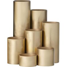 several rolls of gold foil sitting on top of each other