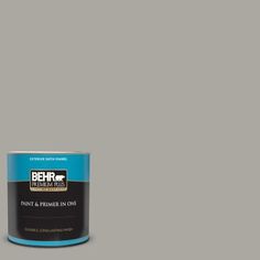 a can of behr paint on a white background