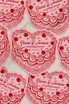 red paper cutouts with hearts and laces on them are arranged in the shape of heart - shaped doily