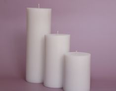 Introducing our classic white, flat-top pillar candles. Theses candle are truly versatile. They are extremely popular for weddings, engagements, parties, events, or simply home décor. They are a pure white color, and are made from a soy wax blend, ensuring a quality candle known for its long, clean burn. This listing comes in a set of 3 pillar candles as shown in the picture. The height ranges from tall to small. The diameter of the pillars are all the same: 3" diameter. There heights are as fol Ivory Pillar Candles, White Pillar Candles, Simply Home, White Flat, Hand Candle, Wedding Parties, Paraffin Wax, Natural Soy Wax, Small Wedding