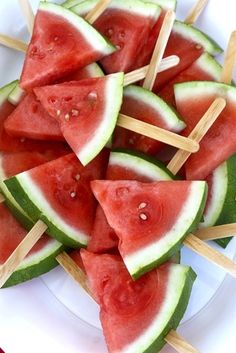 watermelon skewers with toothpicks on a plate