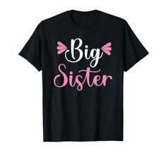 a black shirt with pink lettering that says big sister