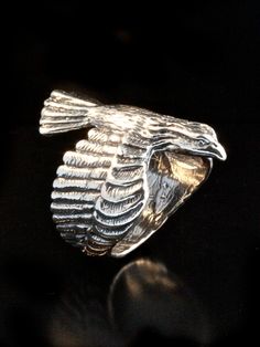 "Take flight wearing this impressive Eagle Ring. The ring is cast in solid sterling silver with detailed wings that wrap around the finger to form the band. This proud and powerful Eagle Ring rests 1 3/8\" long on the finger. I have wanted to create a ring like this for many years and a special commemorative request recently motivated me to make this Eagle Ring take flight. This is a new ring design and until I have had time to build inventory, I will need to custom make the ring in your chosen Eagle Jewelry, Jewelry Bird, Art Clay Silver, Bird Ring, Eagle Necklace, Bird Rings, Clay Silver, Eagle Ring, Long Ring