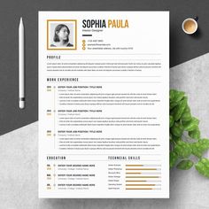 a professional resume template with an orange and black color scheme on the cover, sitting next to a cup of coffee