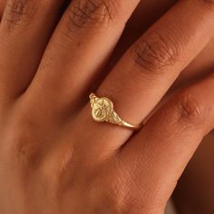 "Enhance your style with our exquisite 14k Gold Bee Ring. This charming bee signet ring features intricate details and is perfect for adding a touch of nature-inspired beauty to your everyday look. Crafted with sterling silver, this ring is available in various sizes and can be personalized to create a unique and thoughtful gift for a special someone, especially for moms. Its oval vintage design adds a hint of classic elegance, while the dainty gold band brings a touch of sophistication. Make a statement with this stunning piece of bee jewelry, suitable for women of all ages. Whether you're treating yourself or searching for the perfect gift, our Gold Bee Ring is sure to capture hearts and make a lasting impression. ♥ Product Specifications ♥ Material : Sterling Silver is an 14k gold-fille Woman Signet Ring, Bee Signet Ring, Gold Pinky Ring Women, Signet Rings Women Vintage, Dainty Gold Band, Pinkie Ring, Wedding Ring Finger, Pinky Signet Ring, Pinky Rings