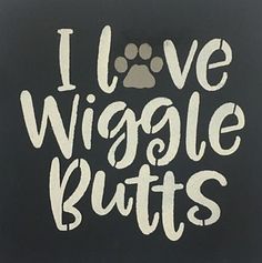 i love wiggle butts sign with a paw on it