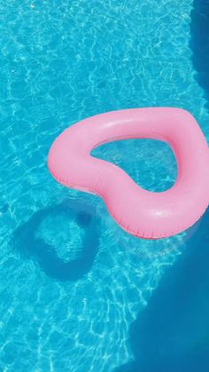 an inflatable swimming ring floating on top of a pool