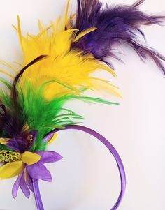 Mardi Gras is all about feathers, beads and fun!  The Mardi Gras King in 1982 gave each color its own meaning: purple for justice, green means faith, and gold represent power. Our adult sized feather headband is ready to ship  ORDER YOURS TODAY IN TIME FOR MARDI GRAS! 👑 SHIPS OUT IN 1 BUSINESS DAY 👑 Mardi Gras Headband, Tiffany Jones, Beautiful Christmas Scenes, Flapper Headband, Feather Headband, Christmas Scene, Christmas Earrings, Turbans, Hair Accessories Headbands