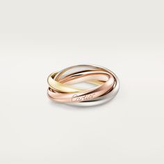 Classic Trinity ring Cartier Rose Gold Wedding Ring, Luxury Cartier Rose Gold Ring, White Cartier Ring - Fine Jewelry, Cartier White Fine Jewelry Rings, White Cartier Rings In Fine Jewelry, White Cartier Fine Jewelry Ring, Modern Gold Cartier Rings, Classic White Cartier Rings, Luxury White Cartier Rings