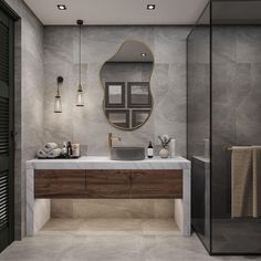 a bathroom with a sink, mirror and towel rack on the wall next to it