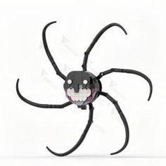 a black spider with an evil smile on its face and arms, standing in front of a white background