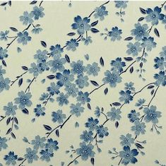 blue and white flowers on a cream background