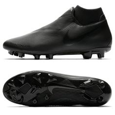 a pair of black nike soccer shoes