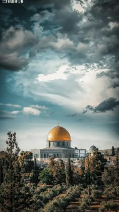 the dome of the rock in the middle of trees under a cloudy sky with dark clouds