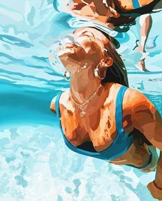 two women swimming in a pool with clear blue water